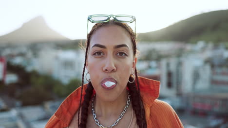 woman in city, portrait with bubblegum