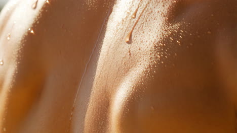 close-up of human skin with water or sweat droplets