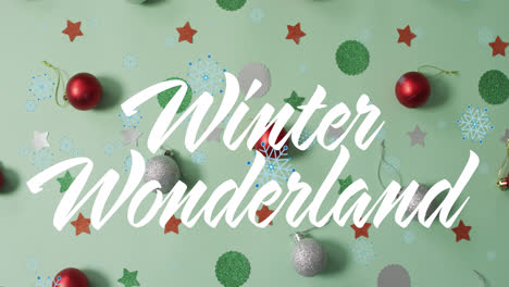 Animation-Von-Winterwunderlandtext-über-Weihnachtsdekorationen