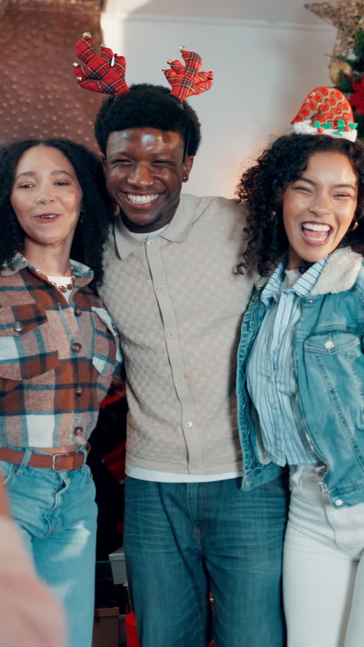 Joyful Young Friends Posing and Laughing at a Christmas Party
