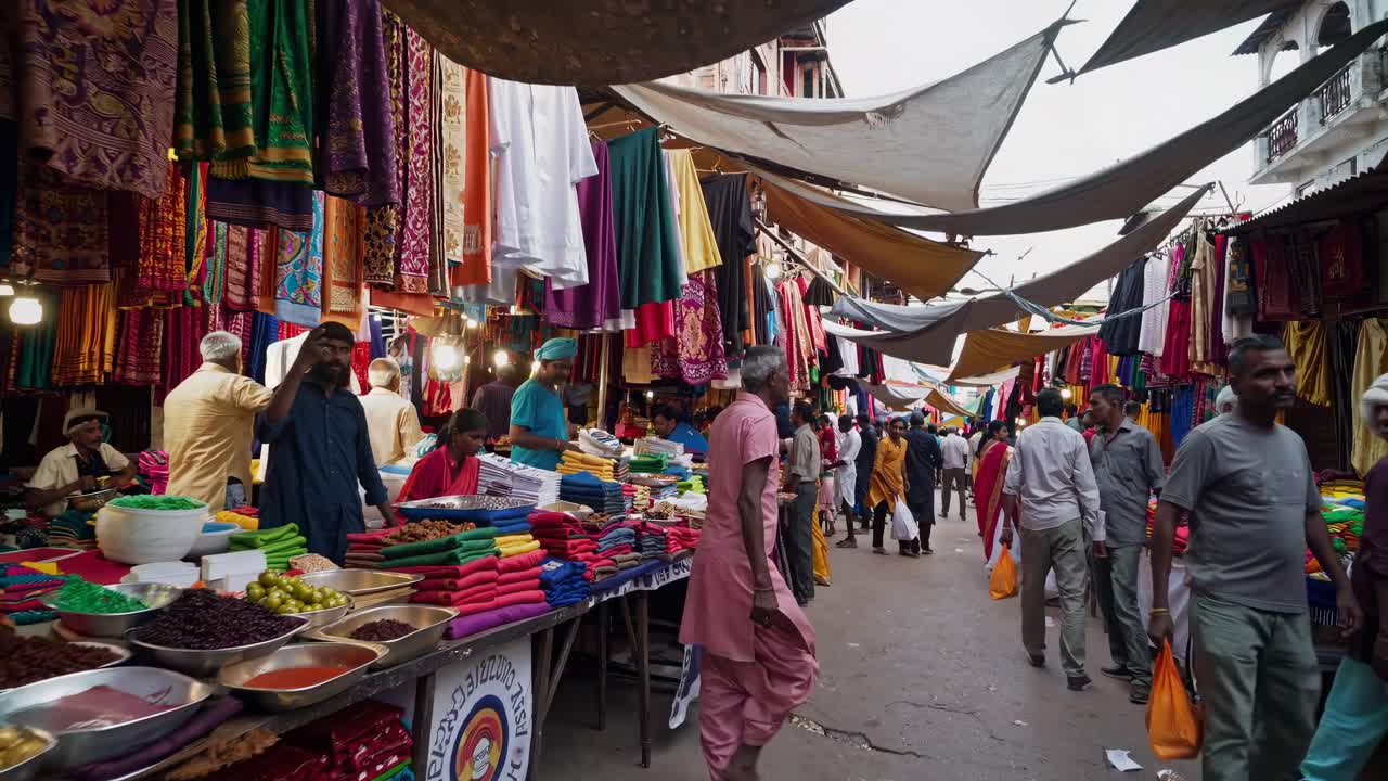 Vibrant market scene video with colorful textiles and bustling shoppers