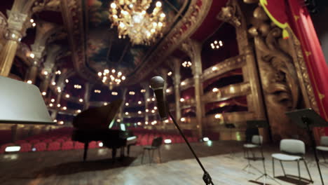 microphone on stage in a grand opera house