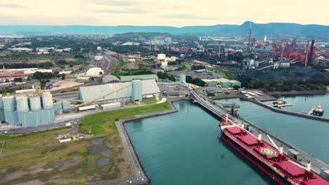 aerial drone pullback view of port kembla, in the illawarra region of nsw