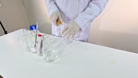 scientist conducts a bromothymol blue experiment, showcasing color changes in a lab setting with precise movements