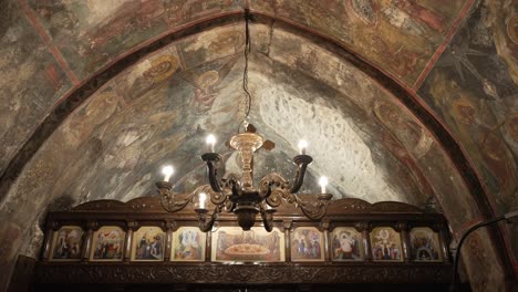 greek orthodox church interior shot shows the church dome and chapel with beautiful hagiography