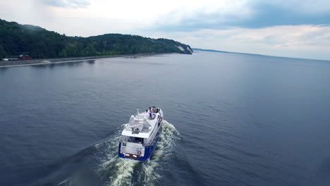 White-yacht-sailing-on-water.-Summer-journey-on-water.-Tourist-ship