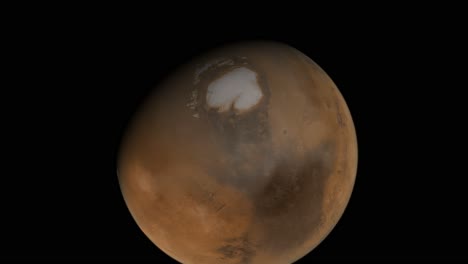 mars and it's moons seen from high above in a beautiful space animation, as the planet spins through day and night