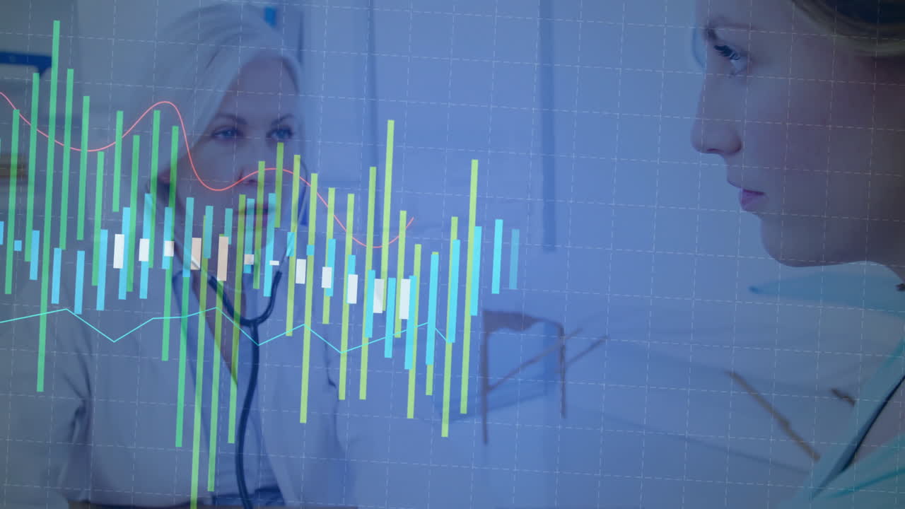 Analyzing patient data with graph overlay, medical professionals in hospital setting