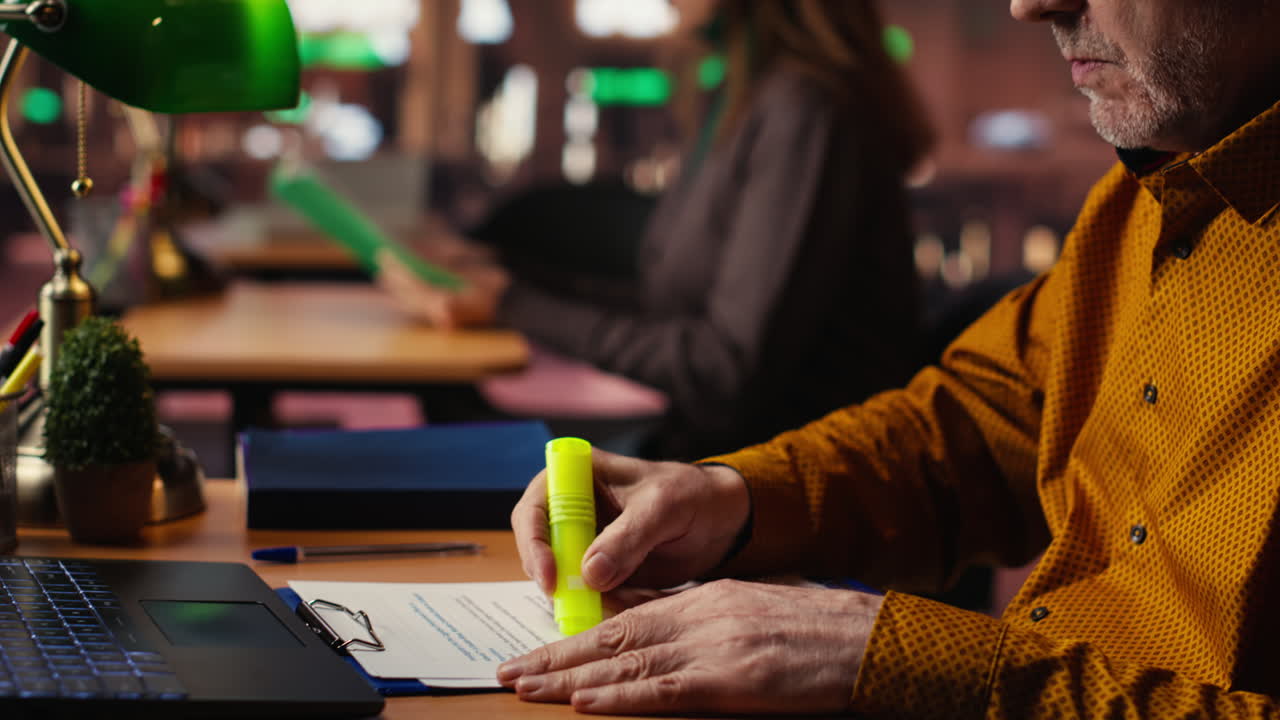 Man working in office with laptop