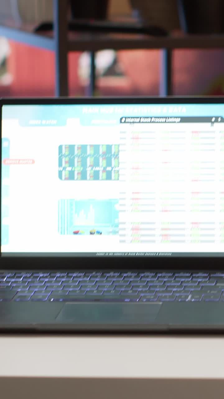 Laptop Screen Displaying Financial Data and Stock Market Statistics