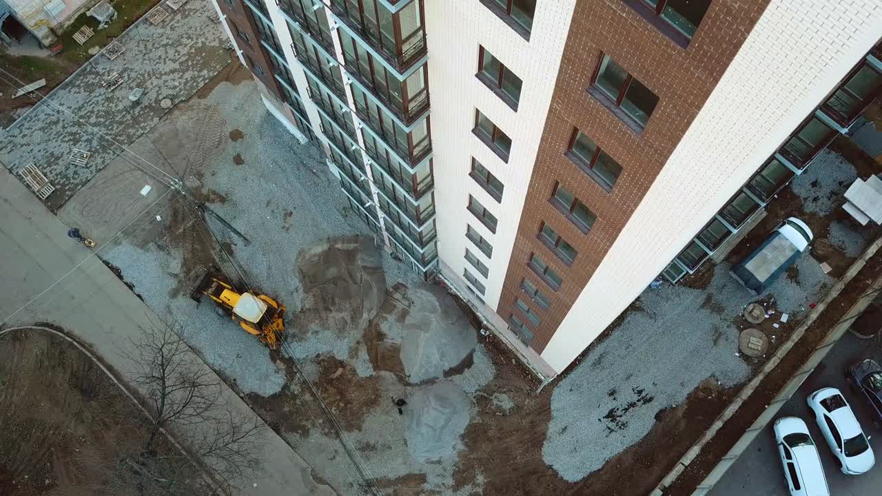 Newly constructed building. Aerial view of building construction site district
