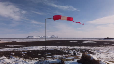 windsock on a arctic airfield in iceland 4k