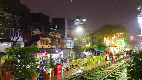 vibrant lights illuminate a bustling railroad area