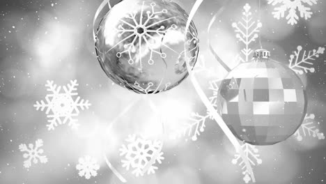 Animation-of-snow-falling-over-silver-christmas-baubles-decorations