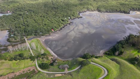 bridge between motutapu island and volcanic rangitoto island