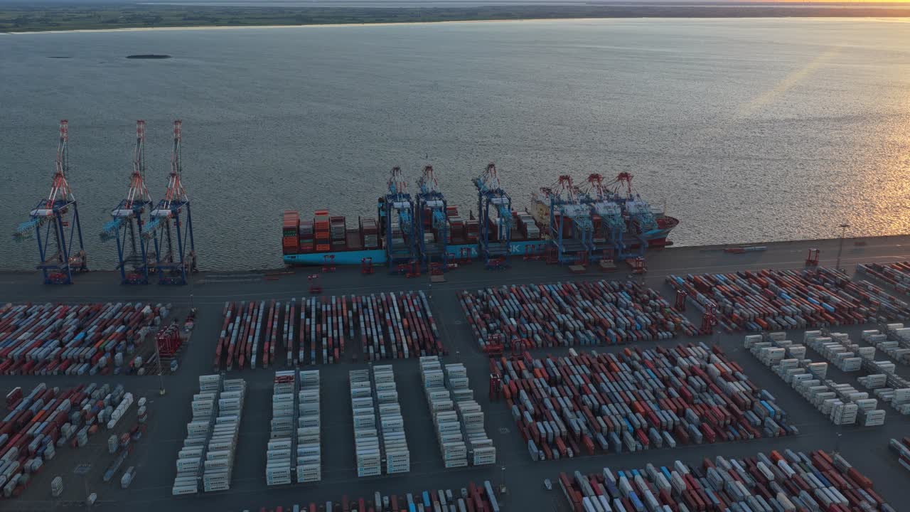 Large freight port in Bremerhaven with loading cranes
