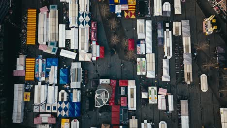 Aerial-hyperlapse-showing-buildings,-cars-and-city-landscape