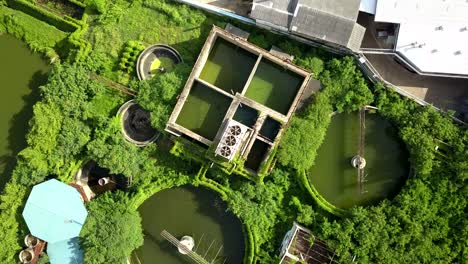 aerial top view 4k of waste water treatment system in industrial estate