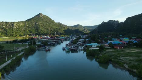 drone moving towards bang pu fishing village revealing this complete landscape, sam roi yot national park, prachuap khiri khan, thailand