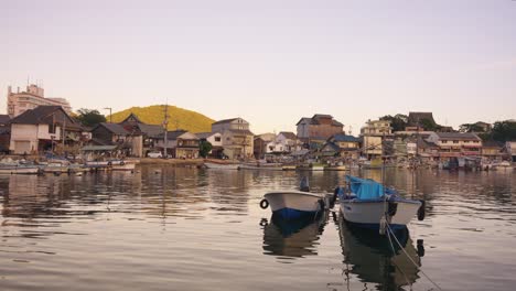 tomonoura fishing town in hiroshima prefecture, japan. peaceful sunset over port