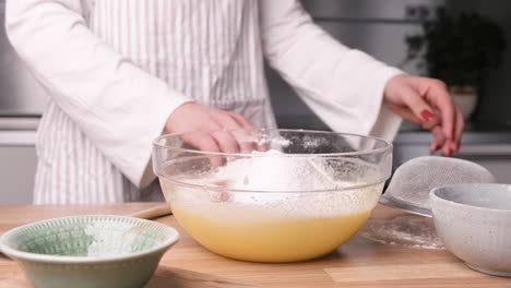 baker preparing ingredient mix for carrot cake batter - slider left