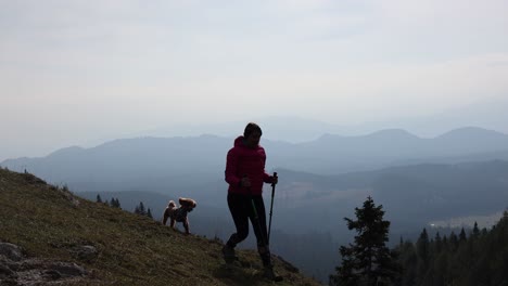 woman hiking in mountains during weekend cheerful girl