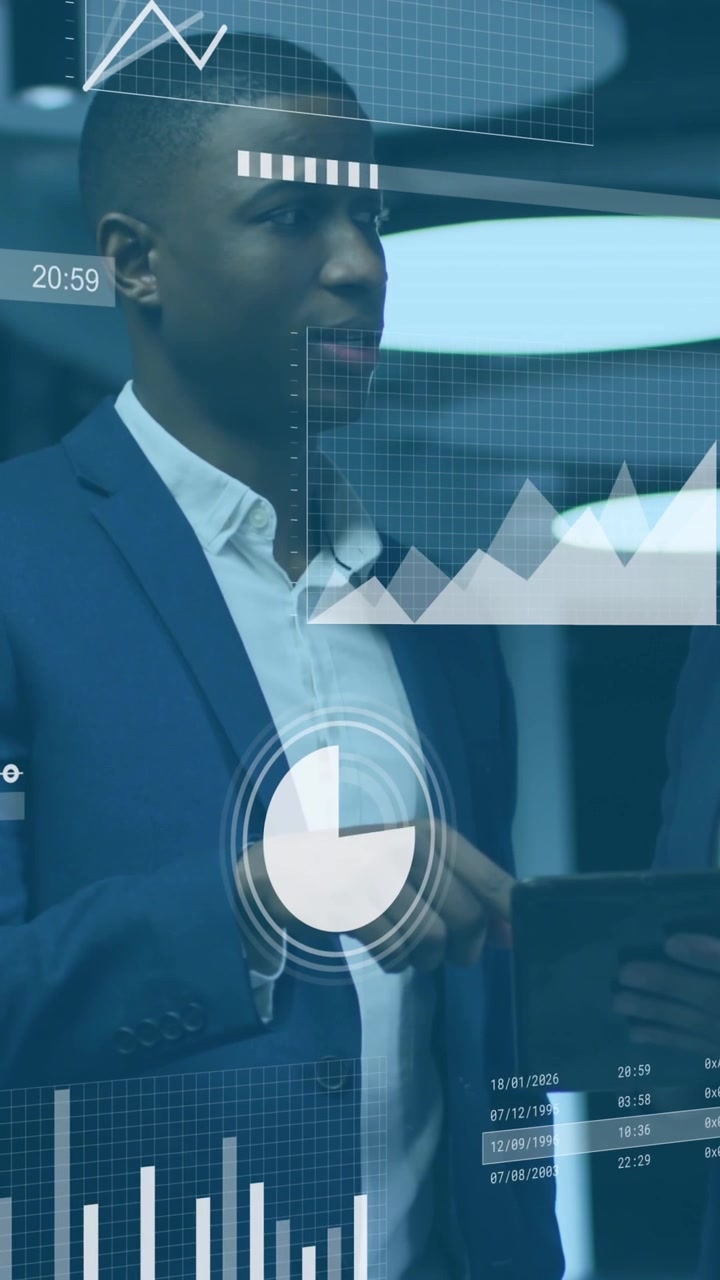 Animation of data processing against diverse businessman and businesswoman discussing at office