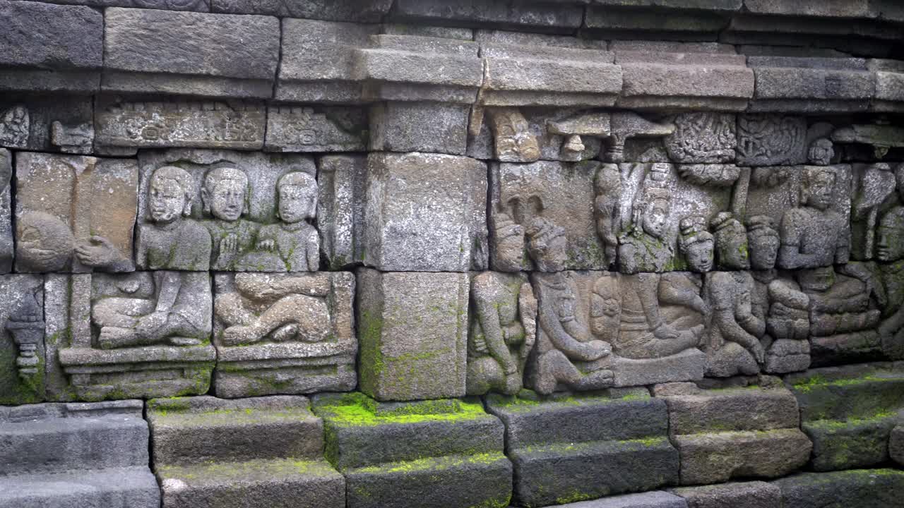 Indonesia,Jawa Island,Yogyakarta, Unesco world heritage Borobudur Temple's inside, wall reliefs, telling stories from history and buddhist religion.