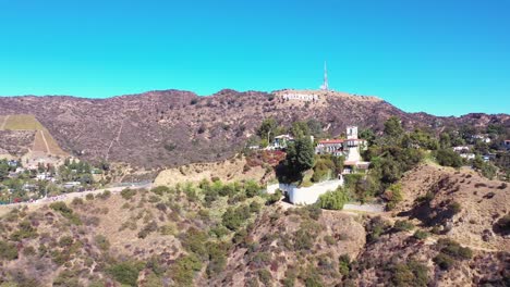 rising aerial over the hollywood hills the hollywood sign and hillside mansions neighborhoods and homes