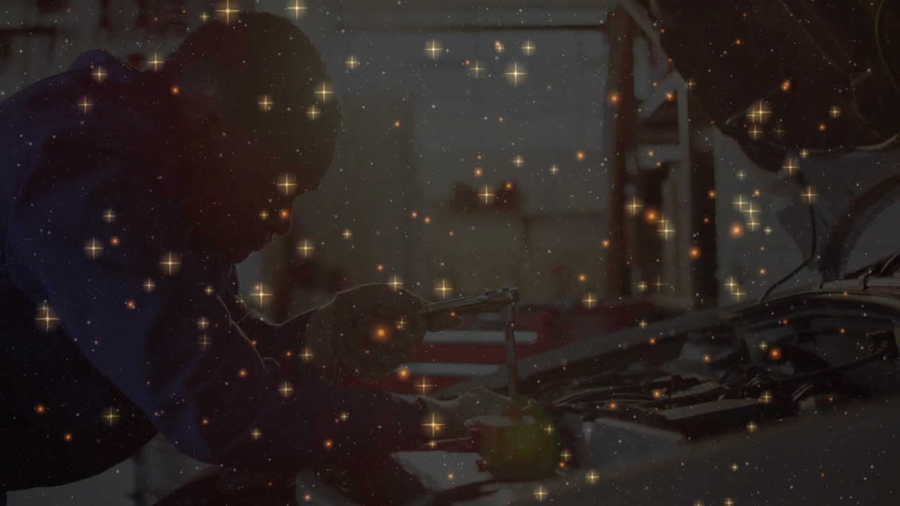 Woman mechanic tightening engine bolts in automotive workshop, showing animated starfield overlay