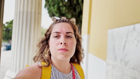 young woman posing for selfie at zappeion hall in athens