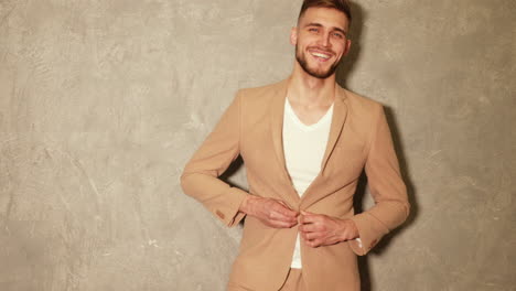 man in beige suit