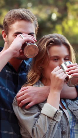 couple enjoying warm drinks together