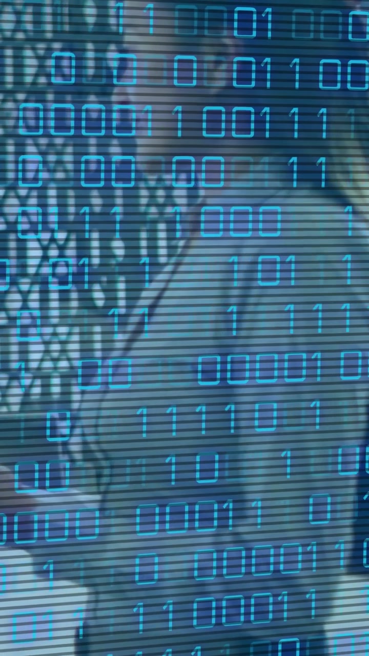 Vertical video: Woman shifting torso, reaching to table as binary scanlines revealing divider, tech
