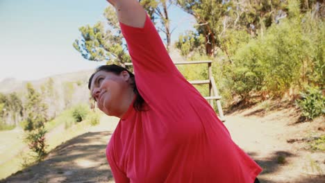 woman exercising during obstacle course