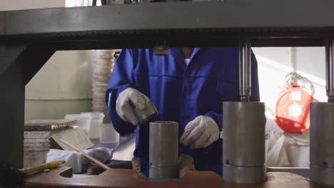 mixed race man working in factory