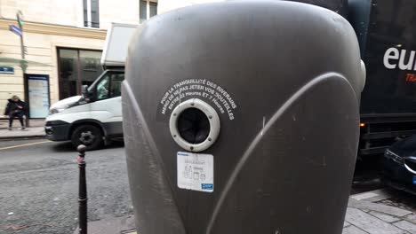 garbage bin and trucks on paris street