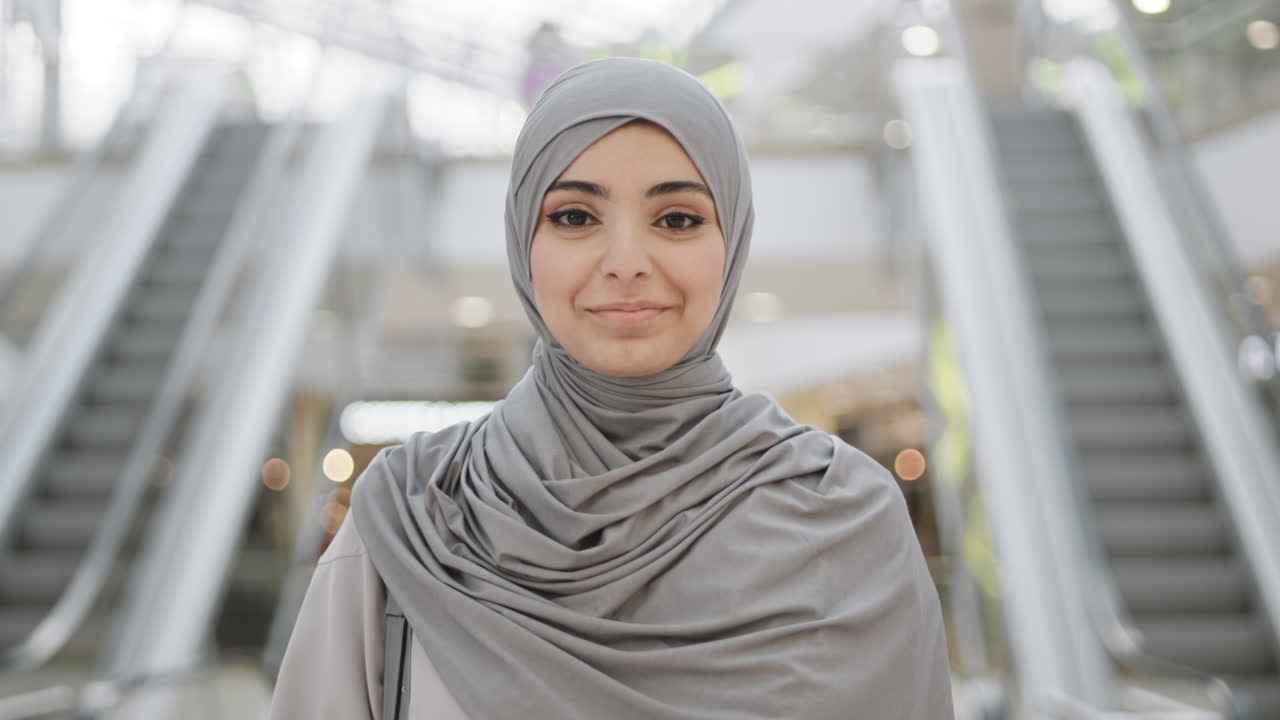 Young Muslim Woman in Mall