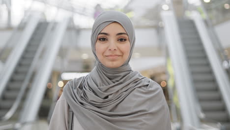 young muslim woman in mall