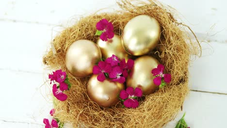 golden easter eggs in the nest