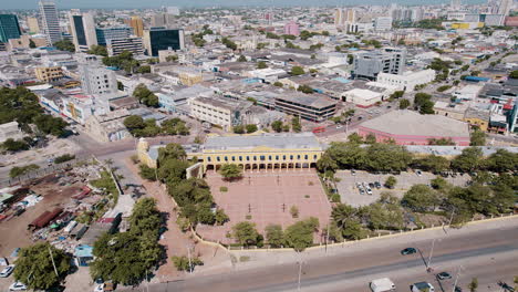 Aerial-view-of-Plaza-de-la-Aduana,-with-the-city-in-the-background
