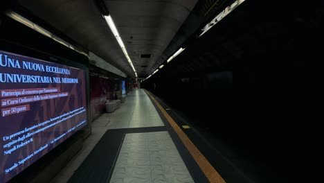 empty platform with colorful advertisements