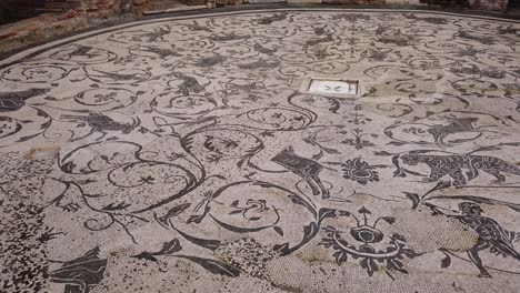 mosaics and arches in the world famous archaeological site of ostia antica in the suburb of rome