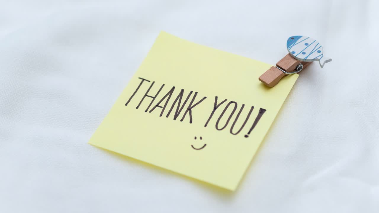 A heartfelt thank you note captured in a minimalist setting showcasing appreciation creatively.