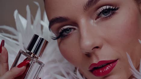 woman holding perfume bottle, glamorous and elegant makeup.