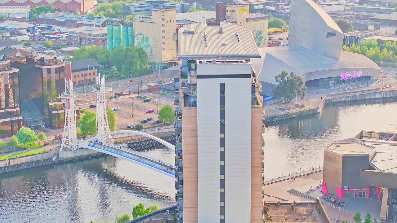 Aerial View Of Waterside Tall Tower Building Overlooking Canal and Museum, Media City UK, Manchester England