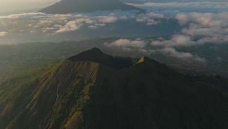 spectacular morning view of volcano mount batur with large crater, aerial