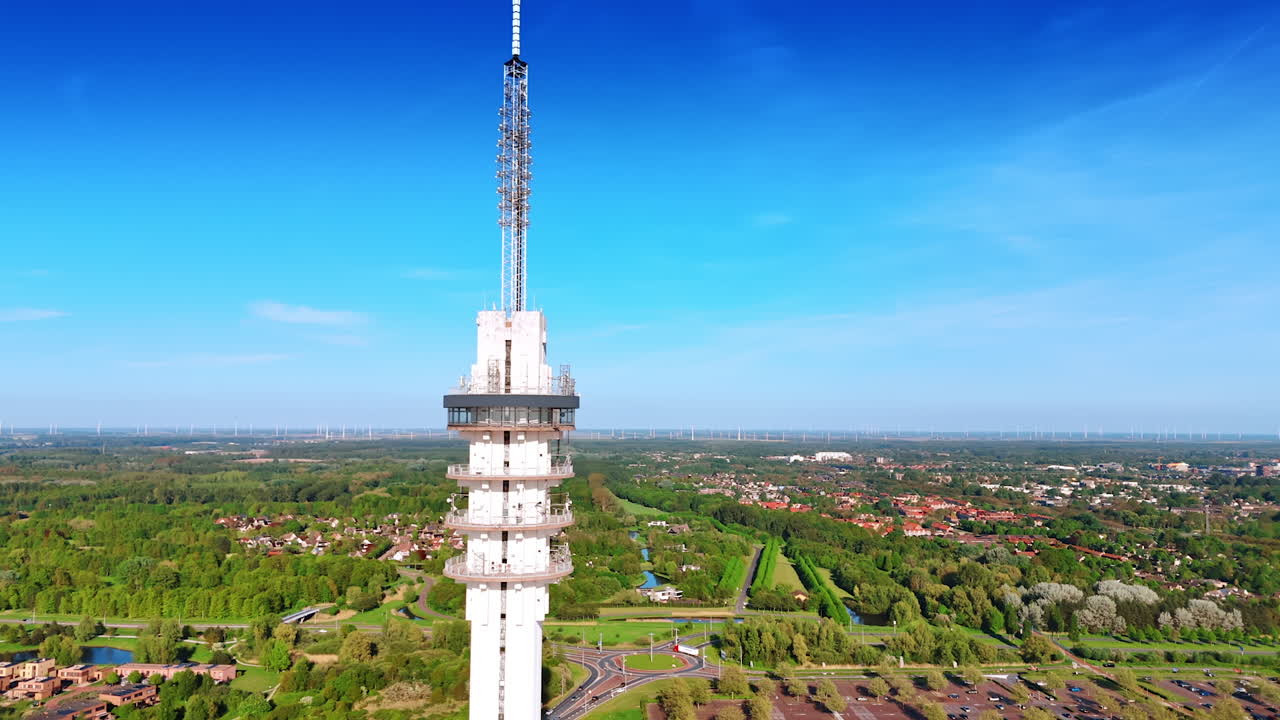Top of the telecom tower. Aerial perspective on the beautiful panorama of a green city Lelystad, the Netherlands.