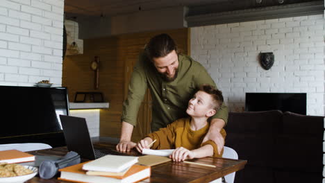 Caucasian-man-and-boy-in-the-living-room