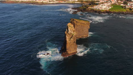 mosteiros beach on sao miguel island: orbital aerial view over rock formations near the beach